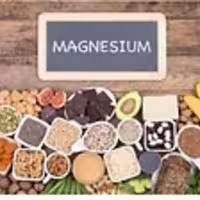 A visual guide showing a variety of magnesium-rich foods like nuts, seeds, and dark chocolate, with a sign that reads "MAGNESIUM."