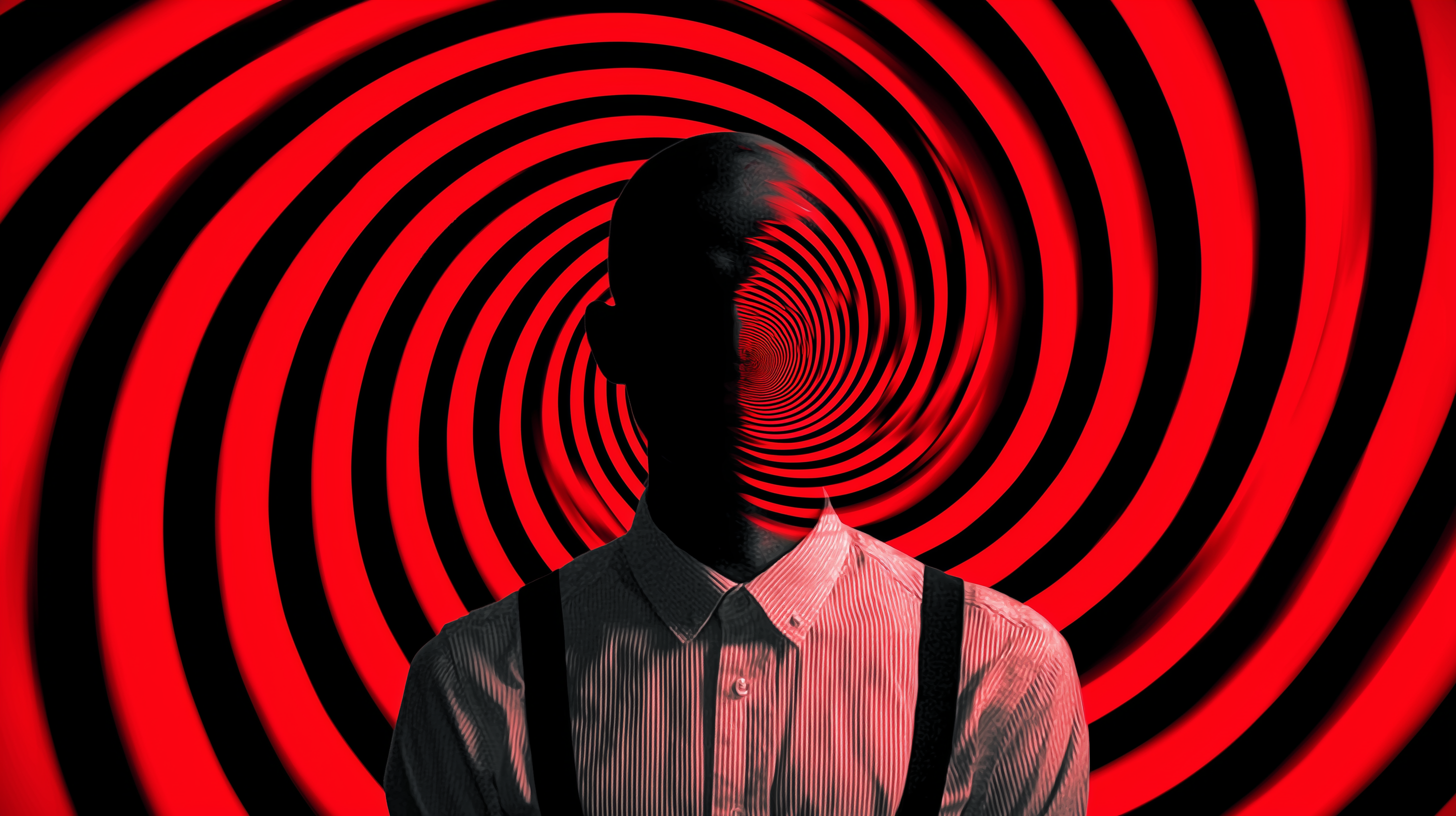 Silhouette with hypnotic spiral background representing vertigo and dizziness
